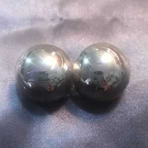Sterling silver button style earrings.